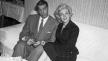Marilyn Monroe i Joe DiMaggio sjede